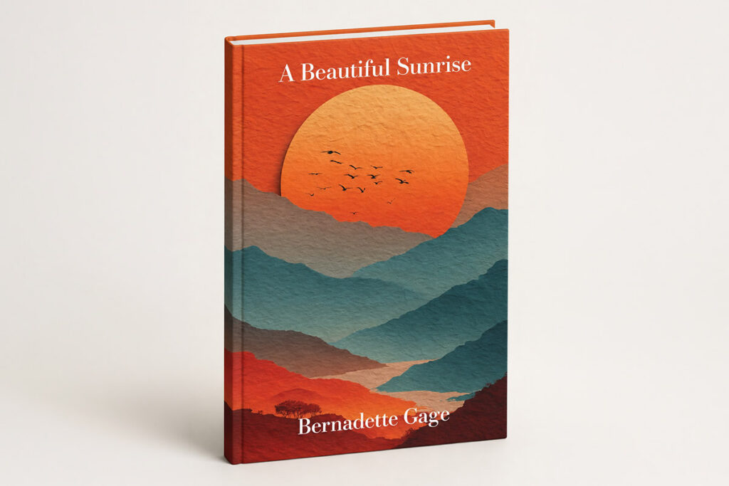 A hardcover book titled A Beautiful Sunrise by Bernadette Gage features an illustration of mountains in warm hues beneath a large orange sun with birds flying across the sky.